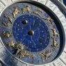 Golden zodiac astrological clock, sunlight and shadow
